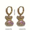 Boucles d'oreilles petit ours sur anneau serti de zircon