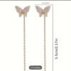 Boucles d'oreilles Papillon et Zirconia scintillant.