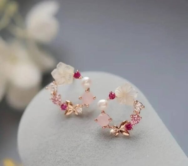 481764049_122139499880518320_8435414974611057302_n Boucles d'oreilles pierre rose et transparente
