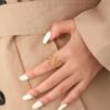 Bague ajustable, design floral creux chic en acier inoxydable