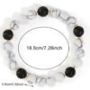 Bracelet en pierre de marbre et accents noirs avec perles d'espacement doré