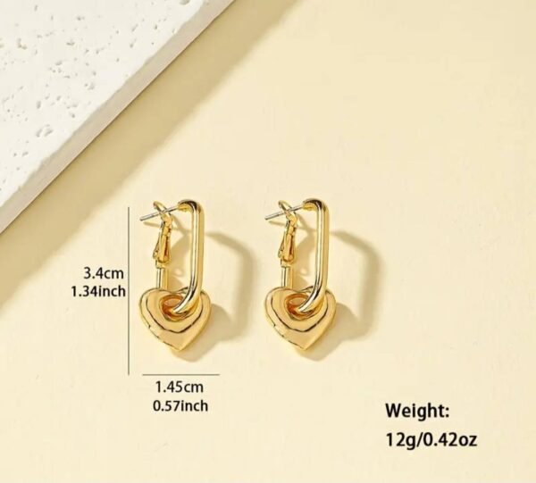 486098389_122142675284518320_9178414936236676753_n Boucles d'oreilles pendantes en forme de cœur Plaqué or