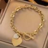 Bracelet en acier titane avec fermoir OT en forme de cœur avec zircone cubique