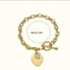 Bracelet en acier titane avec fermoir OT en forme de cœur avec zircone cubique