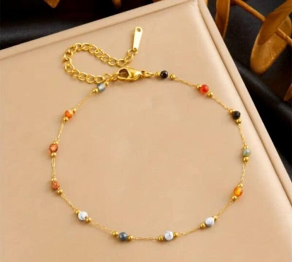 490568302_122145603476518320_1713866968335847703_n Chevillière en acier inoxydable avec perles