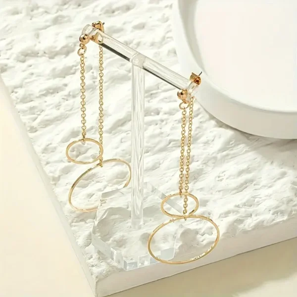 a0afff63-f39b-4287-b7f9-8877d35ffacb Boucles d’Oreilles Minimalistes à Chaîne Longue Géométrique Rondes
