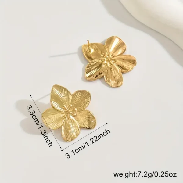 d063e448-c1f9-4f52-af9a-ce0816f817f9 Boucles d'Oreilles Élégantes en Alliage Doré à Motif Floral (Coloris doré ou argenté)