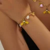 Bracelet en Acier Inoxydable Doré Abeille et Floral avec Design à Maillons