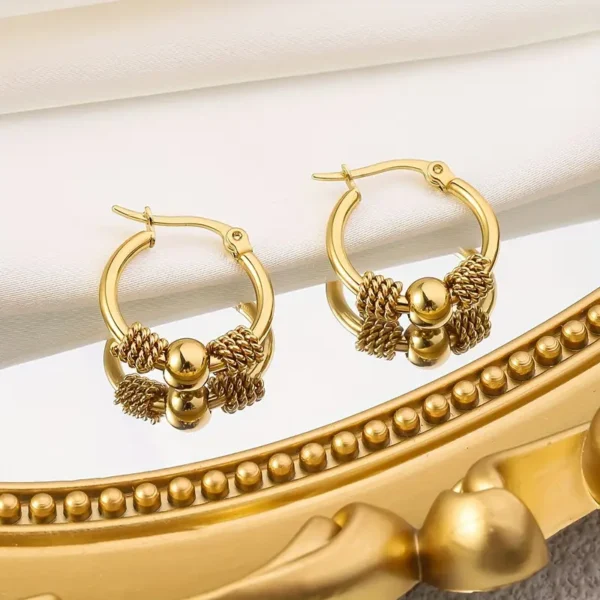 242bc14d-dc08-45f0-83e1-c0126e4a943c Boucles d'oreilles Style vintage bohème chic dorée en acier inoxydable