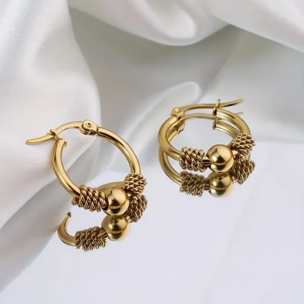 27472a56-c938-4ff3-ac2e-dc9e57b3605f Boucles d'oreilles Style vintage bohème chic dorée en acier inoxydable