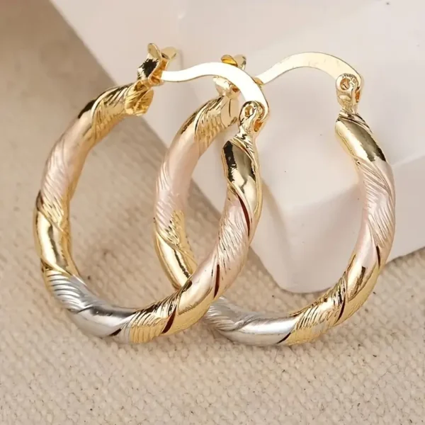 5b34cb076611442597e99dbe1c4048ea-goods Boucles d'oreilles vintage en acier inoxydable avec finition dorée et rosée