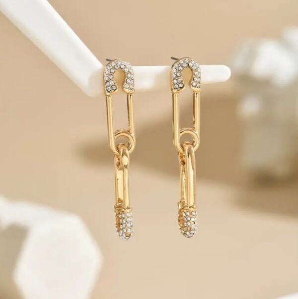 Boucles d'oreilles en forme d'ovale géométrique irrégulière en mosaïque avec des strass