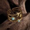Capture d’écran 2025-11-20 170707 Bague Ajustable Doré Élégant avec Motifs Étoile, Lune et Soleil Incrustés de Turquoise en Acier Inoxydable