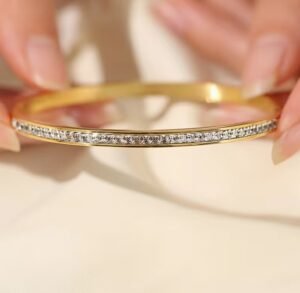 Capture d’écran 2026-01-14 095650 Bracelet Synthétique Doré avec Strass en Acier Inoxydable