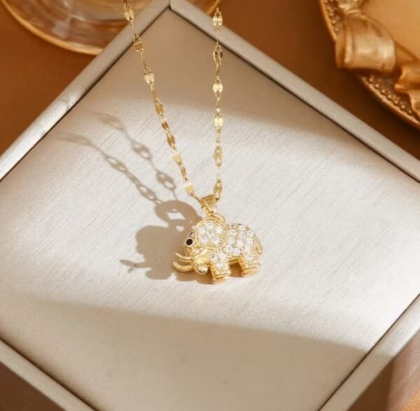 Capture d’écran 2026-01-14 125308 Collier Pendentif Eléphant 3D doré en acier inoxydable