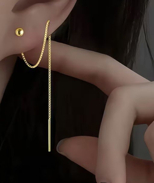 Boucles d'oreilles à pompons dorés en acier inoxydable