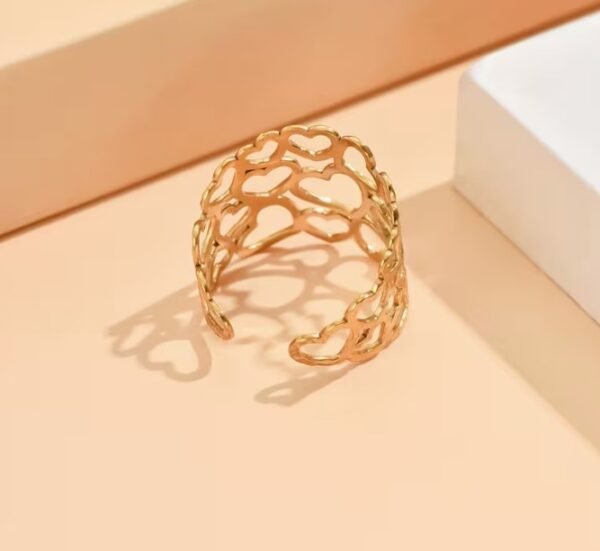 Bague ouverte en cœur ajouré en acier inoxydable